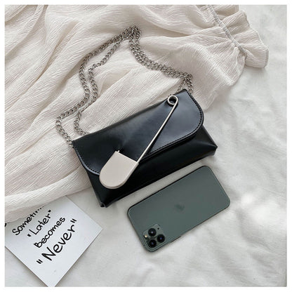 Pin chain shoulder bag
