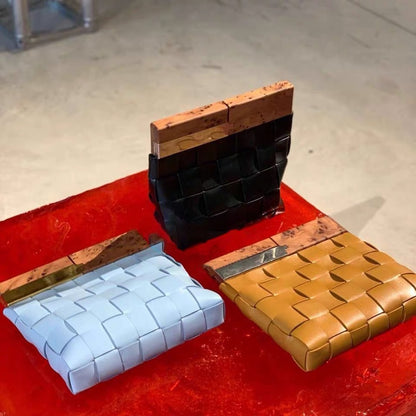 Hand bag woven with wooden handle