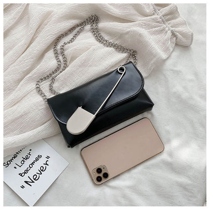 Pin chain shoulder bag