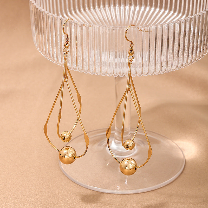 Female French Style Temperament Hollow Water Drops Tassel Long Earrings