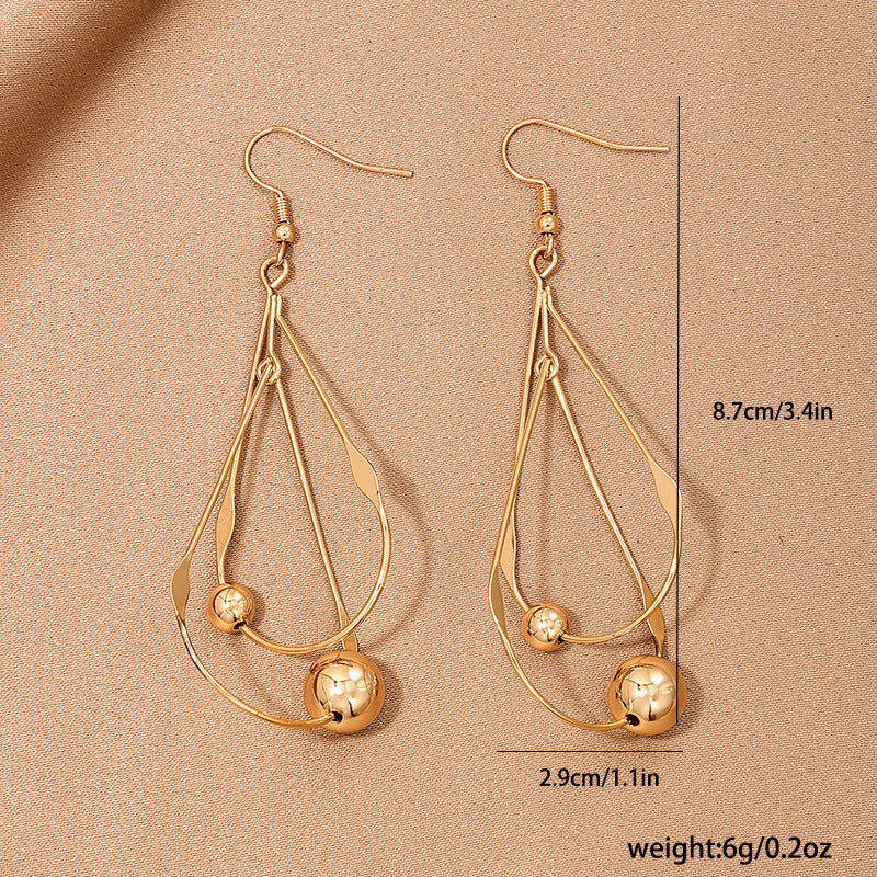 Female French Style Temperament Hollow Water Drops Tassel Long Earrings