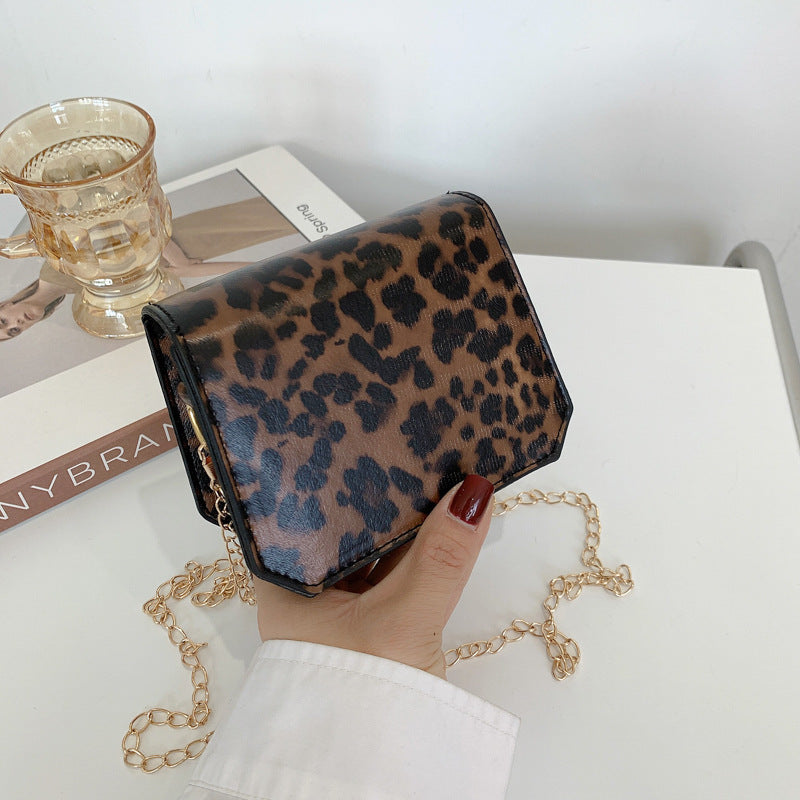 Damenmode Koreanische Version der Lippenstifttasche im westlichen Stil mit Kuhmusterkette