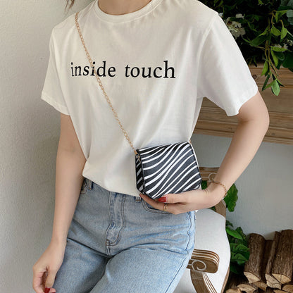 Damenmode Koreanische Version der Lippenstifttasche im westlichen Stil mit Kuhmusterkette